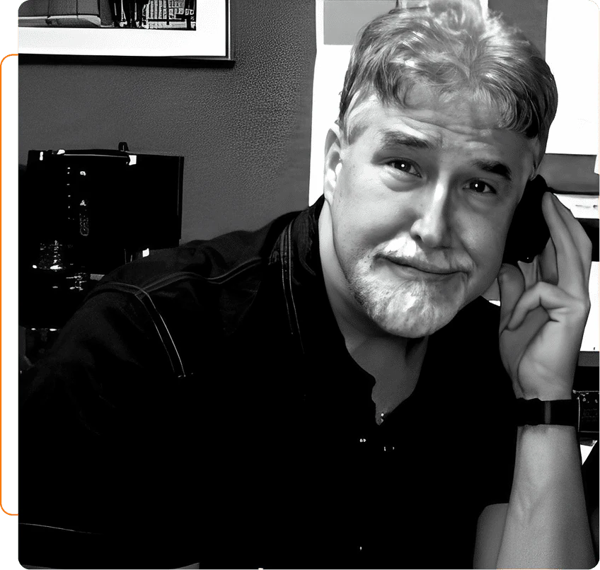 Airlift Mike holding a phone in the studio.